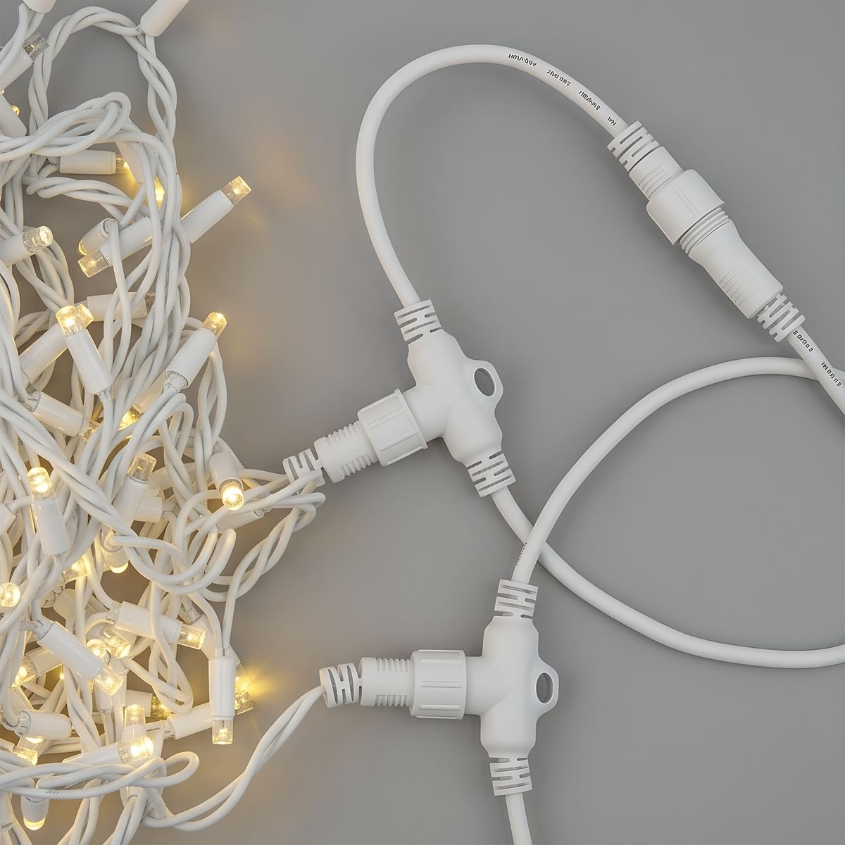 фото провод-шина для гирлянд uniel ucx-f90 t05/2m/wh ul-00013220 | 220svet.ru